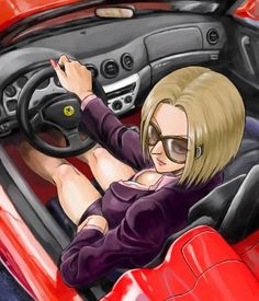 a woman sitting in the drivers seat of a red car with her feet on the steering wheel