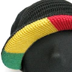 a black hat with red, yellow and green stripes