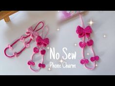 two crocheted hair clips with pink bows on them and the words no sew phone charm