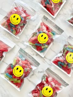 candy candies with smiley faces on them in plastic bags