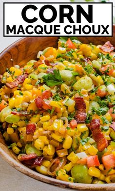 corn and bacon salad in a wooden bowl with the words corn masque choux above it