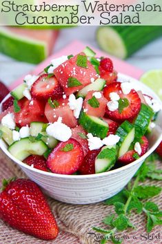 strawberry watermelon cucumber salad in a white bowl