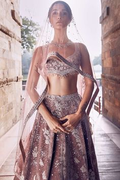 Introducing the french rose opus lehenga set, a masterpiece that intertwines the allure of indian tradition with the vibrant spirit of masai mara artistry. Crafted on a plush velvet base in a soft pink hue, this lehenga is adorned with intricate silver dori and hand embroidery highlights. Blush Lehenga, Lehenga Velvet, Bole Chudiyan, Lengha Sari, Chic Prom Dresses, Indian Bridesmaid Dresses, Velvet Embroidery