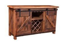 a wooden entertainment center with sliding doors and wine racks