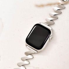 Meet your new favourite watch band. Perfect to add a touch of luxe to any outfit, wear it on repeat to the office, bar and everywhere in between. Crafted from premium stainless steel with a high polish finish to elevate your Apple Watch into a piece of fine jewellery. Our commitment to high quality ensures your bracelet is: Waterproof Rust Free Tarnish Free Nickel Free Plating Need to shorten your band for a firmer fit? Simply flick open & remove the clasp links with your nail - no tool required Silver Stainless Steel Apple Watch Band With Polished Finish, Classic Stainless Steel Bracelet Strap Watch Bands, Silver Polished Stainless Steel Apple Watch Band, Classic Stainless Steel Bracelet Watch Band, Modern White Gold Bracelet Strap Watch Bands, Modern Metal Watch Accessories For Gifts, Modern White Gold Watch Bands With Stainless Steel Clasp, Modern White Gold Watch Bands With Bracelet Strap, Modern Stainless Steel Watch Bands With Polished Finish