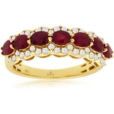 a gold ring with three oval ruby stones and diamonds on the sides, set in 18k yellow gold