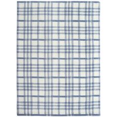 a blue and white plaid rug on a white background