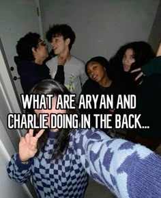 a group of people standing next to each other with the caption what are array and charlie doing in the back