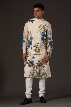 Ivory bundi with bird, floral printed motifs and front buttons.
Components:1
Pattern:Printed
Type of Work:Floral,Bird
Neckline:Band
Sleeve Length:Sleeveless
Fabric:Linen
Color:White
Other Details:
Note: Pant and inner kurta worn by the model is not for sale
Occasion:Destination Wedding - Aza Fashions Kurta Set For Men, Anita Dongre, Rohit Bal, Tarun Tahiliani, Nehru Jackets, Manish, Churidar, Kurta Set, Green Fabric