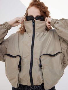 MO&Co. Women's Contrast Cropped Jacket Features : - Athleisure silhouette, gorpcore style- Elasticated drawstring hem- Multifunctional pockets with zip- Water repellent material Code: MBC1JKT013The back length of size S is 55.5cmMATERIALS & CARE Material: 100% PolyesterNote: Buckle up and wash inside outPlease select your own size in the size chart according to your figure and serve model size as a guideline.REMINDER: All items are measured manually. Please note that it's reasonable that there m Luxury Functional Outerwear With Reflective Details, Luxury Outdoor Track Jacket With Detachable Hood, Luxury Spring Utility Windbreaker, Luxury Technical Outerwear With Reflective Details, Luxury Sporty Weatherproof Outerwear, Luxury Long Sleeve Track Jacket For Outdoor, Luxury Outerwear With Reflective Details For Outdoor, Luxury Sporty Outerwear With Multiple Pockets, Luxury Modern Outdoor Track Jacket