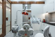 a modern dental room with all white fixtures