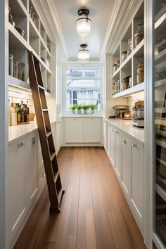 a ladder is in the middle of a kitchen with white cabinets and shelves on both sides