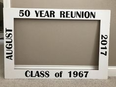 a white frame that says 50 year reunion class of 1967