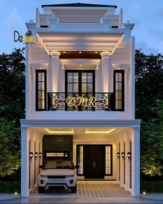 a white car parked in front of a large house with columns and balconies