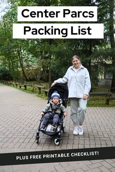 a woman standing next to a baby in a stroller with the text, center parcs packing list plus free printable checklist