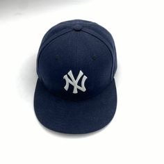 Condition: Used: Seller Notes: Pre owned used cap in good condition, no major damage has basic wear and tear as used previously. See pictures for clarity. It Measures approximately Size 7 1/8, 56.8cm Brand: New Era Gender: Unisex Adult Color: Blue Size: 7 1/8 Team: New York Yankees Country/Region of Manufacture: China Product: Cap, Hat Material: 100% Polyester Navy Fitted Hat For Baseball Season Streetwear, Embroidered Logo Flat Cap For Baseball Season, Classic Navy Baseball Cap For Sports Events, Hip Hop Flat Bill Baseball Cap For Baseball Season, Classic Flat Cap Fitted Hat For Sports Events, Hip Hop Visor Fitted Hat For Baseball Season, Hip Hop Style Visor Fitted Hat For Baseball Season, Navy Snapback For Baseball Season, Classic Snapback For Baseball Season