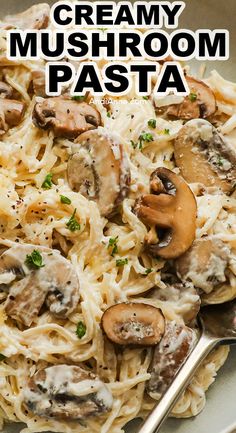 creamy mushroom pasta on a plate with a fork