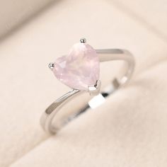 Pink Heart Cut Crystal Ring For Valentine's Day, Pink Heart-shaped Gemstone Ring, Pink Sterling Silver Heart Ring With Center Stone, Pink Crystal Ring For Wedding On Valentine's Day, Elegant Pink Heart Ring For Proposal, Pink Crystal Ring For Valentine's Day Wedding, Pink Crystal Ring For Wedding And Valentine's Day, Pink Heart Cut Jewelry For Proposal, Pink Heart-cut Jewelry For Proposal