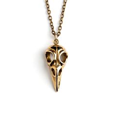 Unisex bird skull pendant beautifully detailed out of bronze, delicate with an edgy wink.  Material: Bronze Dimensions: 27mm by 10mm Comes on a bronze chain All of our jewellery packed in our labelled gift box Let us know if you have any questions, we would love to help you. For more of our necklaces please click here: https://www.etsy.com/uk/shop/Tribulondon?sort_order=date_desc&section_id=16135914 Hope you will love our jewellery as much as we do! Please click here to get to know us better: ht Raven Skull Necklace, Dark Mysterious, Gothic Pendant, Raven Skull, Bird Skull, Packing Jewelry, Skull Jewelry, Skull Necklace, Skull Pendant