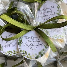 thank you for leaving with love tags tied together in cellophane and green ribbon