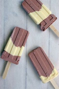 three chocolate and vanilla ice cream pops