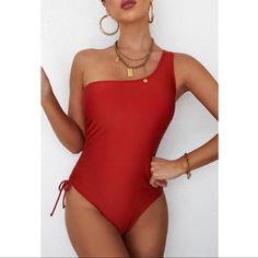 Beautiful Solid Red One- Piece Swimsuit. Slight Padding In The Bust And Drawstring On One Side. S 2/4 M 6/8 L 10/12 Xl 14 Xxl 16 Summer Pool Vacation Beach Resort Chic Summer One-shoulder Bodysuit For Beach, Summer One-shoulder Bodysuit For The Beach, Summer One Shoulder Bodysuit For Beach, Off-shoulder Bodysuit For Summer, Solid Color One-shoulder One Piece For Beach, One-shoulder Solid Color Beach One Piece, Summer One-shoulder Bodysuit For Beach Season, Summer One Shoulder Bodysuit For Beach Season, Red Bodysuit For Beach Party