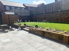 Wetherby (Landscaping Project 57) Raised Flower Beds Sleepers, Using Sleepers In The Garden, Concrete Sleeper Garden Bed, Different Level Garden Sleeper Beds On Corners, Curved Sleeper Raised Beds, Landscaping Makeover, Sleeper Beds, Grey Paving, Practical Garden