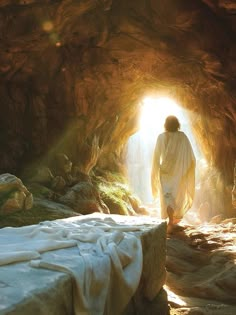 jesus walking into the light at the end of a tunnel that is filled with rocks