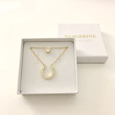 "This sparkly gift set comes with a cubic zirconia horseshoe pendant and a dainty cubic zirconia solitaire. Charms on both necklaces are stationary. It's the perfect pieces to add a touch of elegance to any outfit. The Necklaces can be worn on it's own or can easily be layered with other chokers and necklaces. DETAILS & SIZE *The listing is for one cubic zirconia horseshoe necklace and one solitaire necklace *Available in our high quality 14K gold filled or sterling silver chain and findings Classic Horseshoe Jewelry As A Gift, Lucky Necklace, Necklaces Gift, Horseshoe Pendant, Horseshoe Necklace, Solitaire Necklace, Layering Necklaces, Layered Necklace Set, Gold Necklace Set