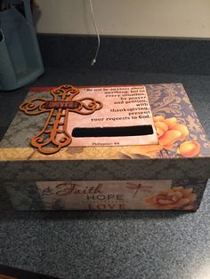 a box that has a cross on it