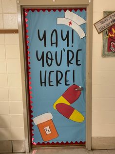 a door decorated with an image of a pair of shoes and a mug that says, yay you're here