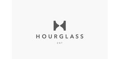 the logo for hourglass, an entertainment company that has been headquartered in europe and asia