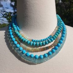 "Neck candy, anyone? Absolutely gorgeous beaded necklaces to add to your layering game! Pictures just don't do justice how sparkly and beautiful these beads are! Please choose from: 1. Aquamarine 4.5-7mm, 19\" plus extender 2. Ethiopian opal 5-6mm, 16\" plus extender 3. Kingman turquoise 4mm, Ethiopian opal, 4 pave diamond rondelles, 16\" plus extender All necklaces are finished with 14k gold clasp and extender chain. Check OliverRafCollection for new listings: https://www.etsy.com/shop/OliverRa Blue Multi-strand Gemstone Necklaces, Blue Gemstone Multi-strand Necklaces, Turquoise Rondelle Beaded Gemstone Necklaces, Blue Multi-strand Gemstone Beaded Necklace, Unique Turquoise Necklaces With Faceted Beads, Turquoise Multi-strand Gemstone Necklaces, Turquoise Multi-strand Gemstone Necklace, Turquoise Gemstone Multi-strand Necklace, Turquoise Crystal Necklaces With Gemstone Beads