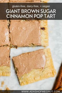 gluten - free brown sugar cinnamon pop tart on a marble surface with cinnamon sticks