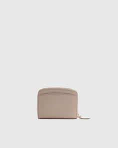 Keep it luxe down to the last detail—like this Italian Pebbled Leather Compact Wallet. The perfect piece for minimalists or when the occasion calls for a pared-down bag, this small but super functional wallet slips into a pocket in a snap. A number of slots and compartments max your organization efforts in its petite footprint.  | Quince | Women's Italian Pebbled Leather Compact Wallet in Taupe, Italian Leather Small But Mighty, Compact Wallet, Top Grain Leather, Quince, Italian Leather, Pebbled Leather, Tory Burch, Slots, Kate Spade