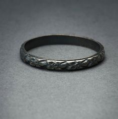 This ring is cast from a mold made from a late 1800's sterling silver hand carved floral band. This is handcrafted at the time of order so please allow 3-4 weeks for his ring to ship. Black Handmade Vintage Engraved Ring, Silver Antique Carved Rings, Vintage Black Carved Rings, Handmade Victorian Metal Rings, Medieval Sterling Silver Engraved Rings, Memento Mori Ring, Wax Seal Necklace, Mold Making, Antique Rings