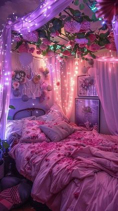 a bedroom decorated in pink and purple with fairy lights on the ceiling, bedding and curtains