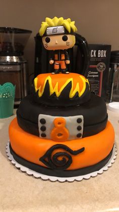 a cake that has been decorated to look like a cartoon character on top of it