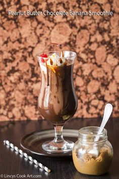 chocolate banana smoothie in a glass on a plate