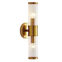 an image of a wall light that is on the side of a white wall with gold trim