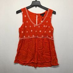 This Listing Is For A - Nwt Sanctuary Women Sleeveless Embroidered Tank Top Blouse Shirt Size Large Condition: New With Tags See Pictures For Measurements & Any Additional Material Details. Embroidered V-neck Tank Top For Spring, Orange Embroidered V-neck Top, Casual Orange Embroidered Blouse, Embroidered Orange V-neck Tops, Summer Sleeveless Embroidered Cotton Top, Casual Embroidered Fitted Tank Top, Embroidered Sleeveless Fitted Top, Casual Embroidered Tank Top For Summer, Orange Sleeveless Cotton Top