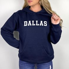 Show your love for Dallas Texas with this design that features Dallas in a classic style.  GILDAN 18500 PULLOVER HOODIE  * Super comfortable unisex heavy blend pullover hoodie  * 50% cotton, 50% polyester  * Pre-shrunk  * Classic fit  * Runs true to size  * Air-jet spun yarn with a soft feel and reduced pilling  * Double-needle stitched collar, shoulders, armholes, cuffs and hem      HOODIE SIZING IN INCHES  S = 20" Width x 27" Length x 33.5" Sleeve  M = 22" Width x 28" Length x 34.5" Sleeve  L Basic Letter Print Hoodie Sweatshirt, Winter Hoodie With Letter Print In French Terry, Fall French Terry Hoodie With Letter Print, Fall French Terry Letter Print Hoodie, Winter Letter Print Hoodie In French Terry, Fall Letter Print French Terry Hoodie, Fan Apparel Hoodie With Ribbed Cuffs, Fall Fan Apparel Hoodie With Adjustable Hood, Winter Fan Apparel Sweatshirt With Kangaroo Pocket