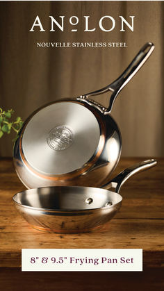 anolon non - stick stainless steel frying pan set on a wooden table