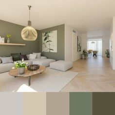 a living room filled with furniture and lots of color swatches in shades of green