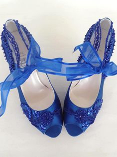 "Royal blue lace wedding shoes for bride, custom heel heights and shoe styles available. These shoes will be your \"something blue\" on your wedding day! Perfect wedding gift, bridesmaids gift, bachelorette gift or engagement gift. Royal blue satin bridal shoes are designed with embroidered lace. Blue beads and sequins are used on the embroidery and blue organza ribbons tie on the front. They are made of soft smooth satin and delicate lace, each handmade item is unique and can differ in details Silver Bridal Shoes, Classic Blue Wedding, Embellished Wedding Shoes, Fall Wedding Shoes, Royal Blue Wedding Shoes, Lace Wedding Shoes, Colorful Wedding Shoes, Wedding Shoes For Bride, Custom Heels