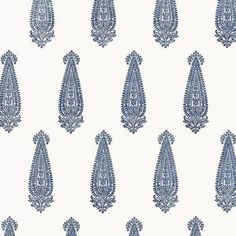 blue and white wallpaper with an intricate design