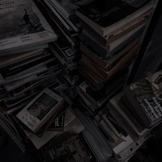 a pile of books sitting on top of a table