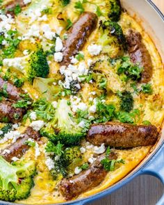 sausages and broccoli in a pan with feta cheese