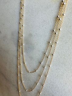 Celebratory pops of Sterling Silver dance along a dainty 14k Gold Fill Chain. 15”, 17”, or 19” lengths available for optimal layering. Double Strand 14k Gold Necklace For Layering, Yellow Gold Pearl Chain Necklace For Layering, White Double Strand Jewelry With Delicate Chain, Dainty Beaded Chain Necklaces For Layering, White Beaded Chain Necklace, Dainty Style, Dainty Beaded Chain Necklace For Layering, Everyday 14k Gold Filled White Chain Necklace, Everyday White 14k Gold Filled Chain Necklace, 14k Gold Filled Necklaces With Delicate Chain For Layering