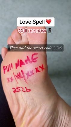 someone has written on their foot with red ink that says love spell call me now